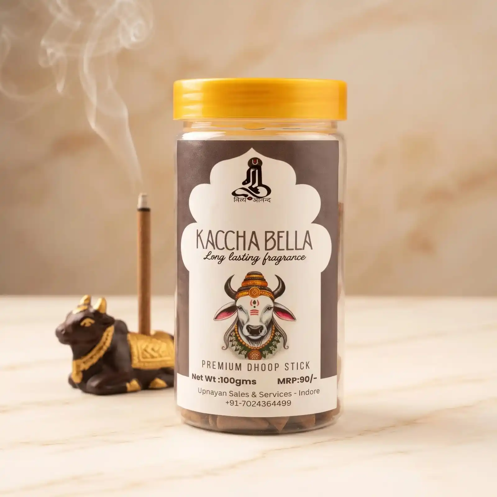 GURU Kaccha Bella Dhoop Stick jar with a Nandi bull idol and lit dhoop stick